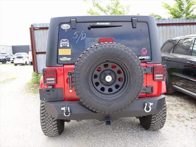 used 2011 Jeep Wrangler Unlimited car, priced at $15,499