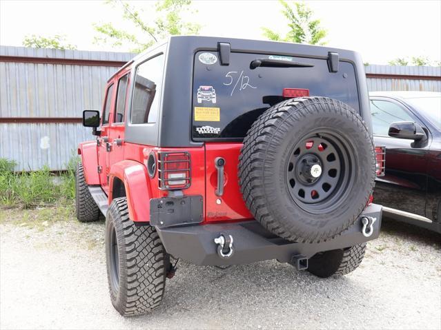 used 2011 Jeep Wrangler Unlimited car, priced at $15,499