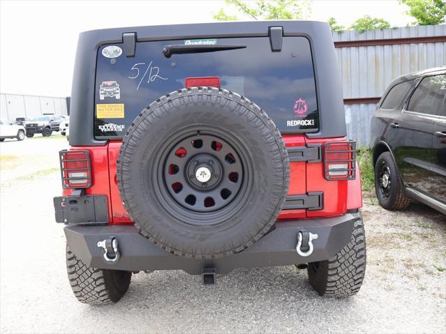 used 2011 Jeep Wrangler Unlimited car, priced at $15,499