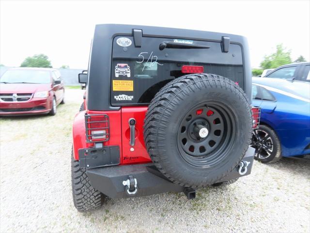 used 2011 Jeep Wrangler Unlimited car, priced at $16,295