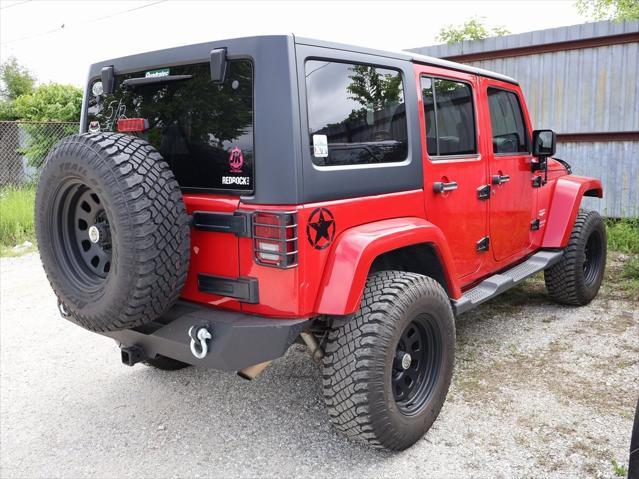 used 2011 Jeep Wrangler Unlimited car, priced at $15,499