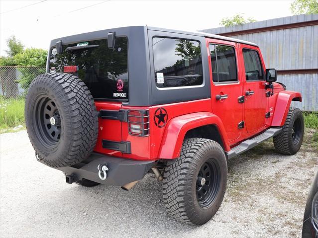 used 2011 Jeep Wrangler Unlimited car, priced at $15,499