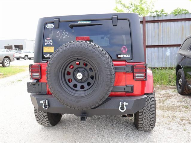 used 2011 Jeep Wrangler Unlimited car, priced at $15,499