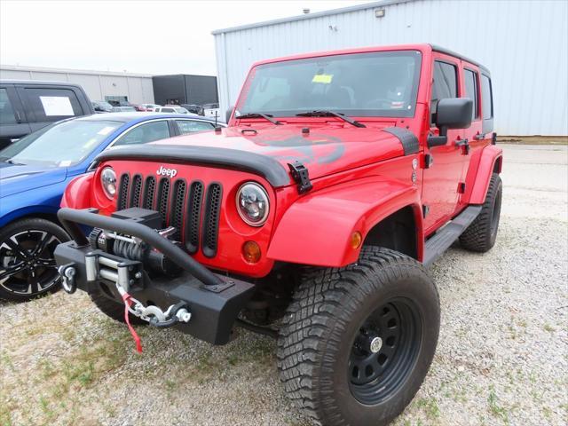 used 2011 Jeep Wrangler Unlimited car, priced at $15,499