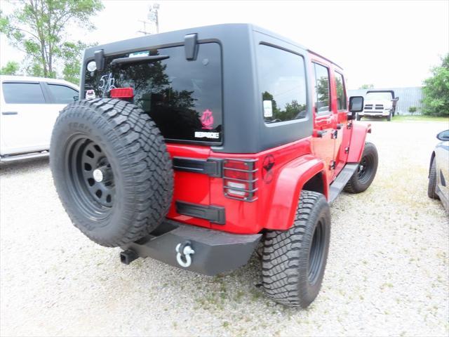 used 2011 Jeep Wrangler Unlimited car, priced at $16,295