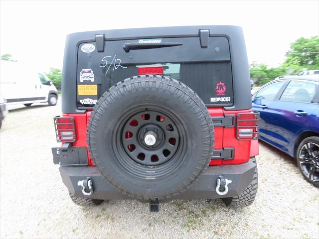 used 2011 Jeep Wrangler Unlimited car, priced at $16,295