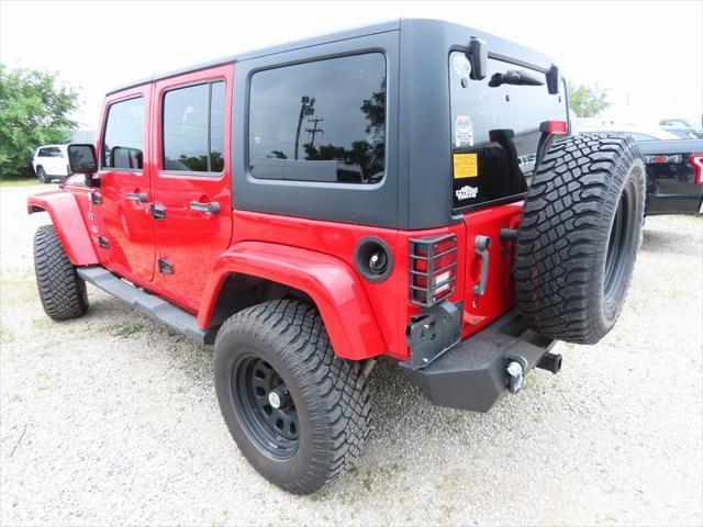 used 2011 Jeep Wrangler Unlimited car, priced at $16,295