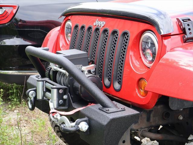 used 2011 Jeep Wrangler Unlimited car, priced at $15,499