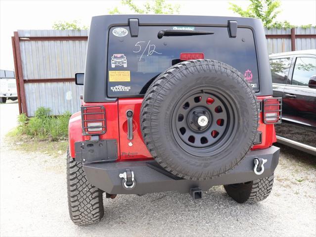 used 2011 Jeep Wrangler Unlimited car, priced at $15,499