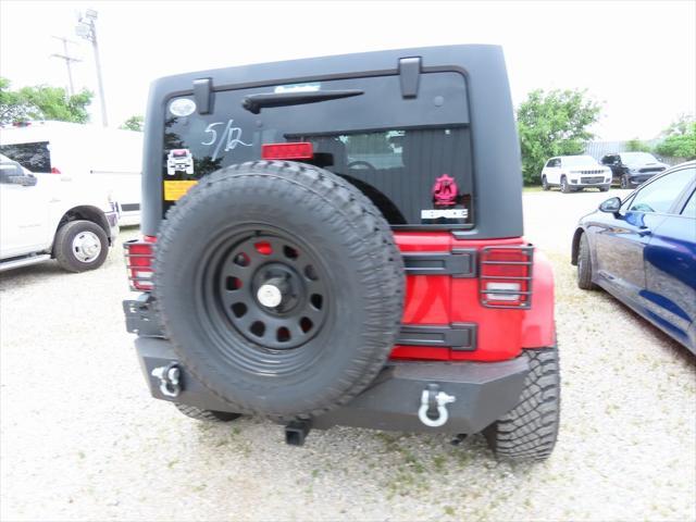 used 2011 Jeep Wrangler Unlimited car, priced at $16,295