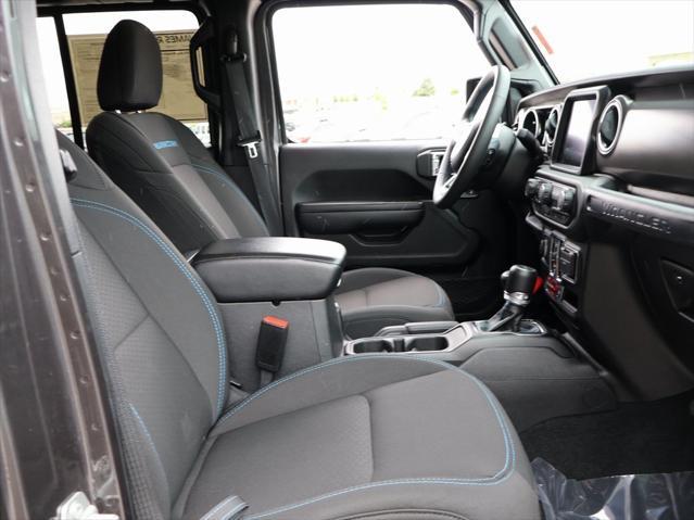 used 2023 Jeep Wrangler 4xe car, priced at $32,699