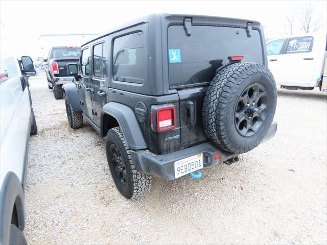 used 2023 Jeep Wrangler 4xe car, priced at $28,368