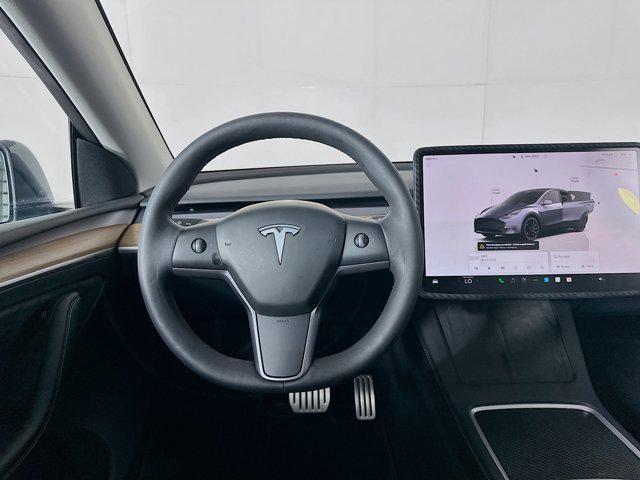 used 2023 Tesla Model Y car, priced at $32,547