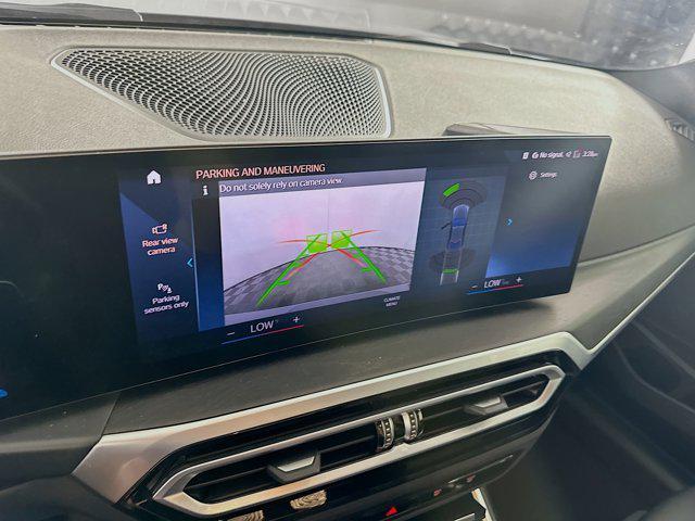 used 2024 BMW 330e car, priced at $32,497