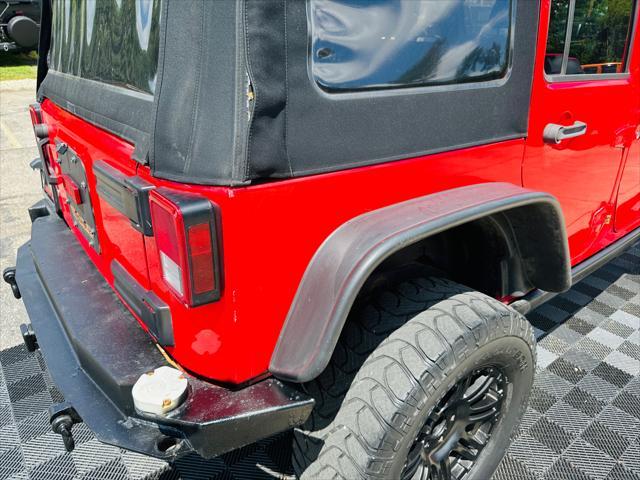 used 2015 Jeep Wrangler Unlimited car, priced at $16,991