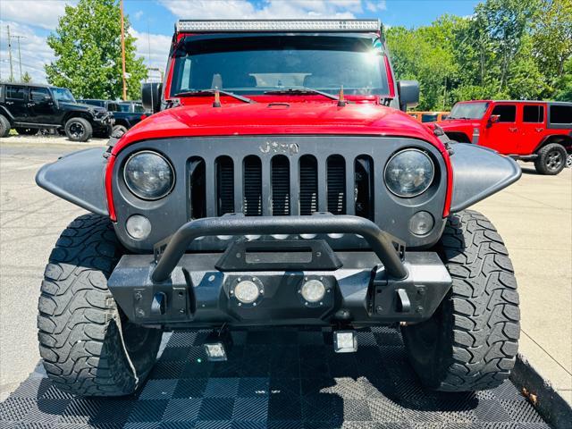 used 2015 Jeep Wrangler Unlimited car, priced at $16,991