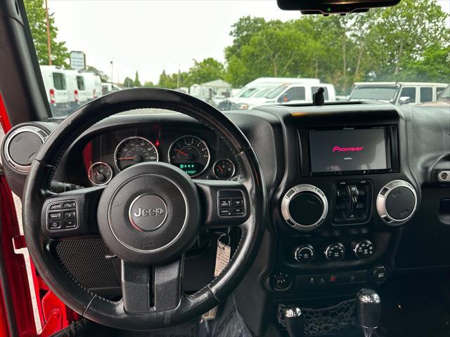 used 2015 Jeep Wrangler Unlimited car, priced at $16,991