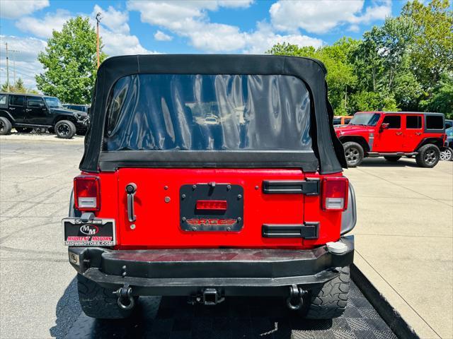 used 2015 Jeep Wrangler Unlimited car, priced at $16,991