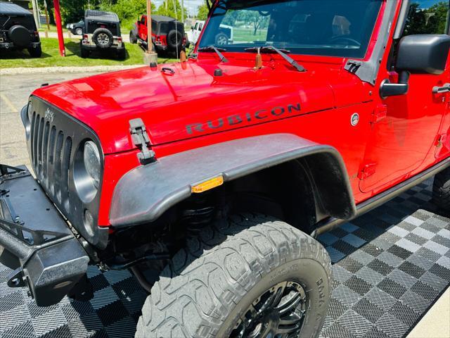 used 2015 Jeep Wrangler Unlimited car, priced at $16,991