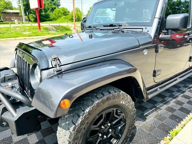 used 2017 Jeep Wrangler Unlimited car, priced at $18,491
