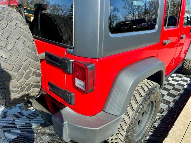 used 2016 Jeep Wrangler Unlimited car, priced at $15,491