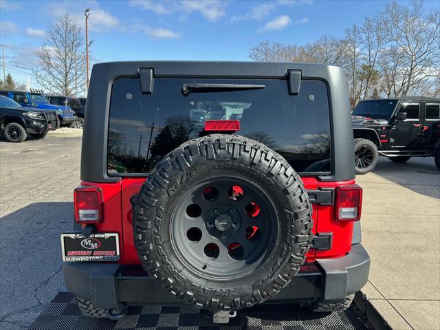 used 2016 Jeep Wrangler Unlimited car, priced at $15,491