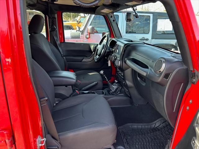 used 2016 Jeep Wrangler Unlimited car, priced at $15,491