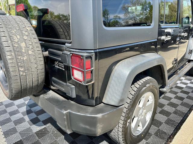 used 2014 Jeep Wrangler Unlimited car, priced at $18,291