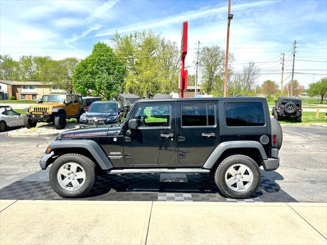 used 2014 Jeep Wrangler Unlimited car, priced at $18,291