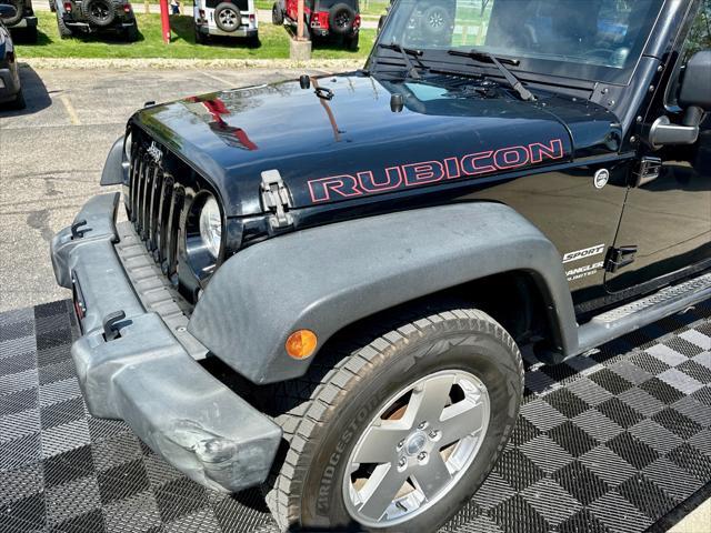 used 2014 Jeep Wrangler Unlimited car, priced at $18,291