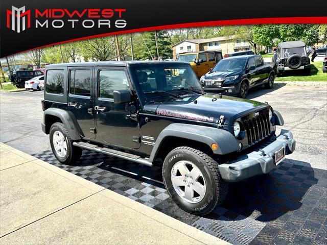 used 2014 Jeep Wrangler Unlimited car, priced at $18,291