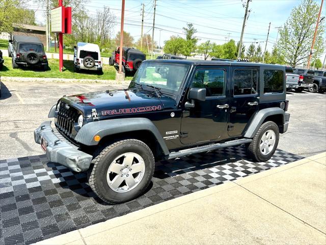 used 2014 Jeep Wrangler Unlimited car, priced at $18,291