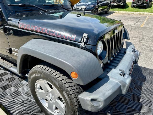 used 2014 Jeep Wrangler Unlimited car, priced at $18,291