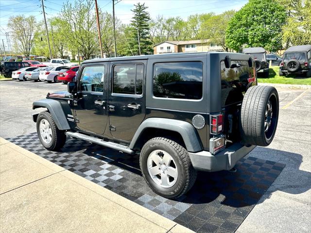 used 2014 Jeep Wrangler Unlimited car, priced at $18,291