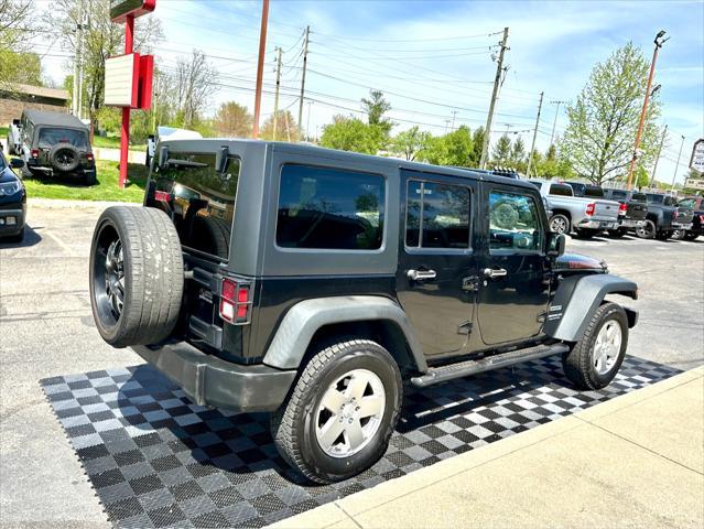 used 2014 Jeep Wrangler Unlimited car, priced at $18,291