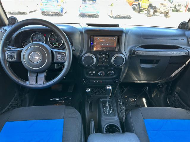 used 2014 Jeep Wrangler Unlimited car, priced at $18,291