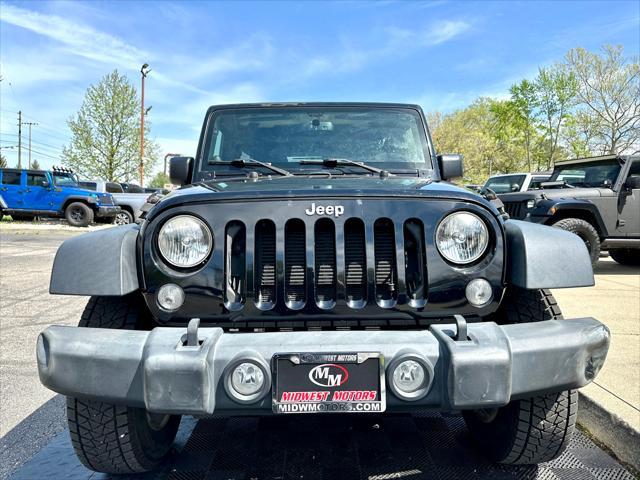 used 2014 Jeep Wrangler Unlimited car, priced at $18,291