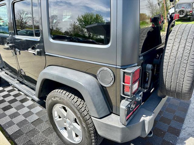 used 2014 Jeep Wrangler Unlimited car, priced at $18,291