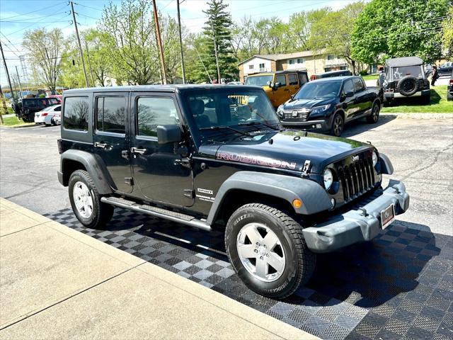 used 2014 Jeep Wrangler Unlimited car, priced at $18,291