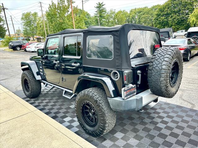 used 2013 Jeep Wrangler Unlimited car, priced at $16,991