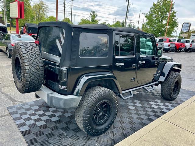 used 2013 Jeep Wrangler Unlimited car, priced at $16,991