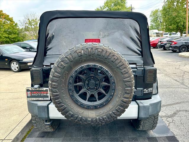 used 2013 Jeep Wrangler Unlimited car, priced at $16,991