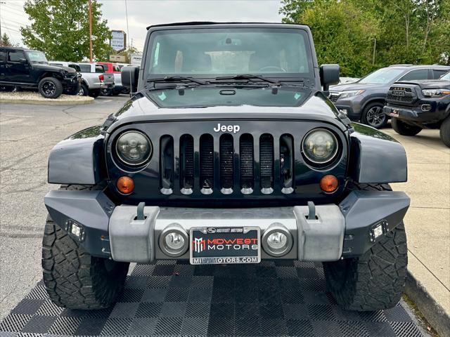 used 2013 Jeep Wrangler Unlimited car, priced at $16,991