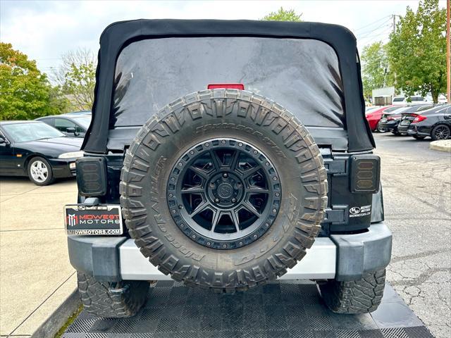 used 2013 Jeep Wrangler Unlimited car, priced at $16,991