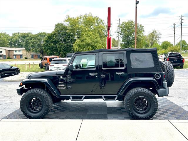 used 2013 Jeep Wrangler Unlimited car, priced at $16,991