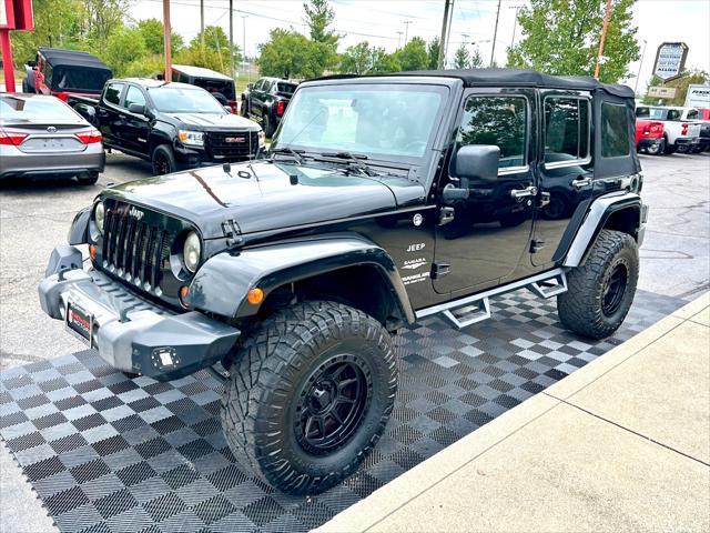 used 2013 Jeep Wrangler Unlimited car, priced at $16,991