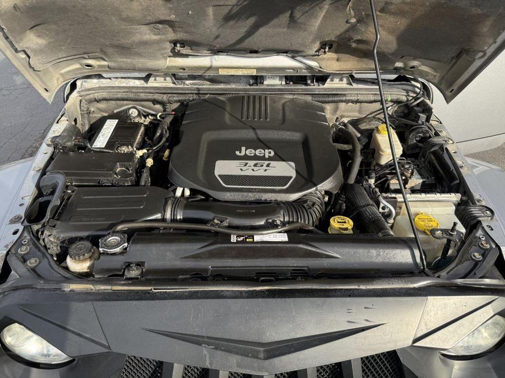 used 2013 Jeep Wrangler Unlimited car, priced at $14,999