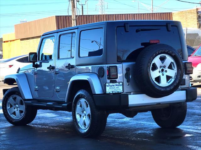 used 2013 Jeep Wrangler Unlimited car, priced at $13,999