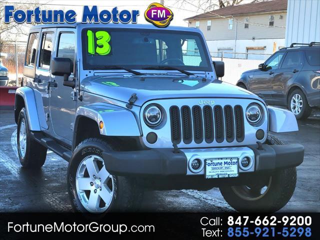 used 2013 Jeep Wrangler Unlimited car, priced at $13,999