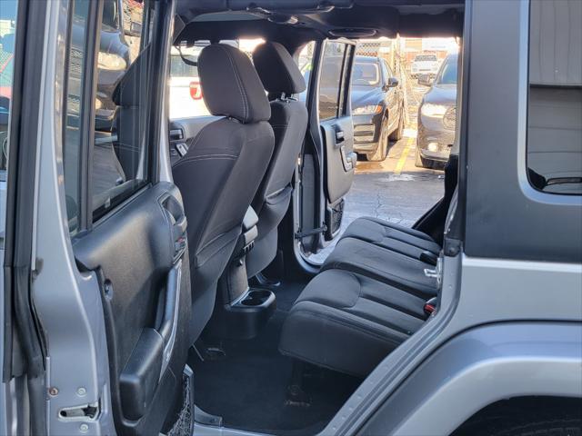 used 2013 Jeep Wrangler Unlimited car, priced at $13,999